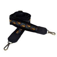 Lizzy Guitar Bag Strap - Golden Paisley, a stylish black strap with intricate woven patterns, perfect for enhancing your guitar bag.