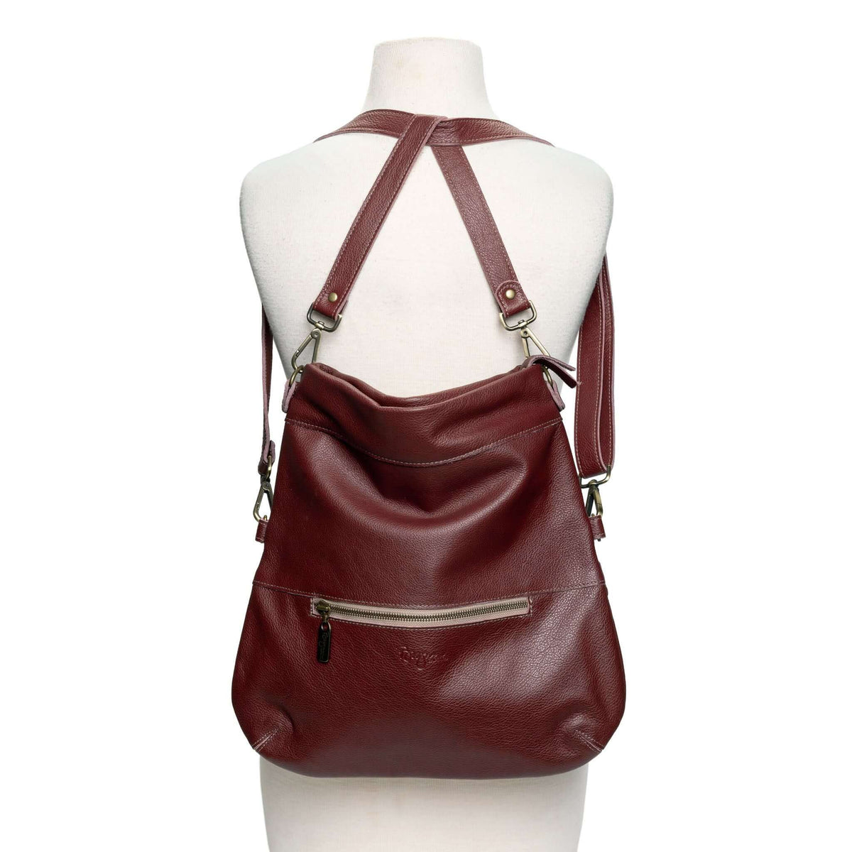 Mini Lauren 6-in-1 Convertible Leather Crossbody Bag in burgundy, a versatile leather crossbody bag for everyday use. Shown as a backpack style.