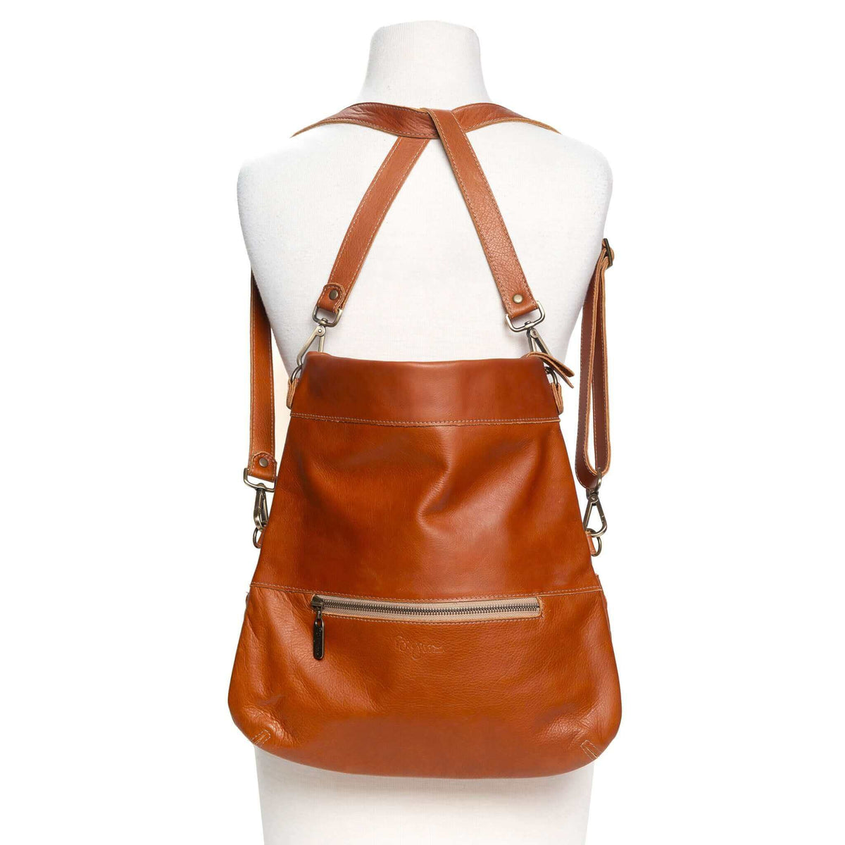 Mini Lauren leather crossbody bag in whiskey, convertible backpack style with adjustable straps.