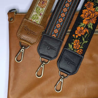 Lizzy Guitar Bag Strap - Diamonds with colorful woven prints and leather details on a stylish handbag.