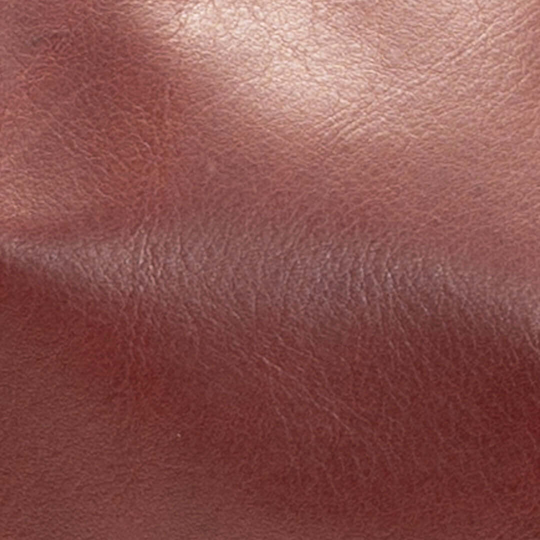 Close-up of merlot leather texture for Original Lauren 6-in-1 leather crossbody bag.