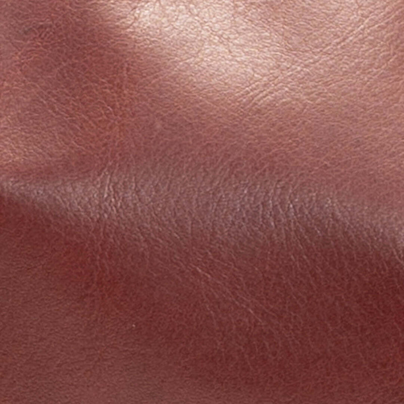 Close-up of merlot leather texture for Original Lauren 6-in-1 leather crossbody bag.