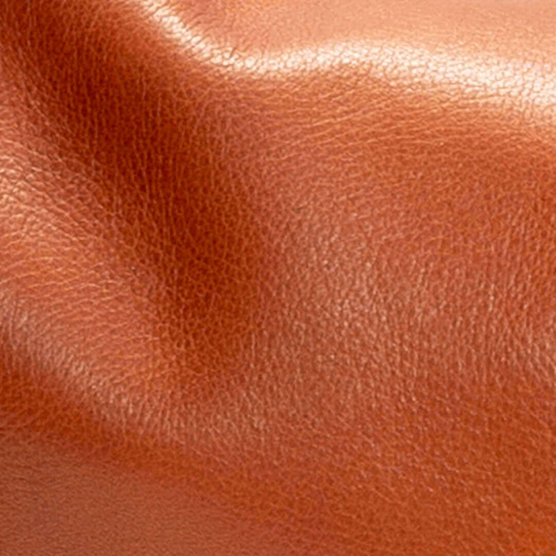 Close-up texture of whiskey leather for the Original Lauren leather crossbody bag.