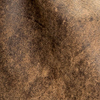 Close-up of distressed brown texture, showcasing quality material used in Pamela Hobo Crossbody Bag.