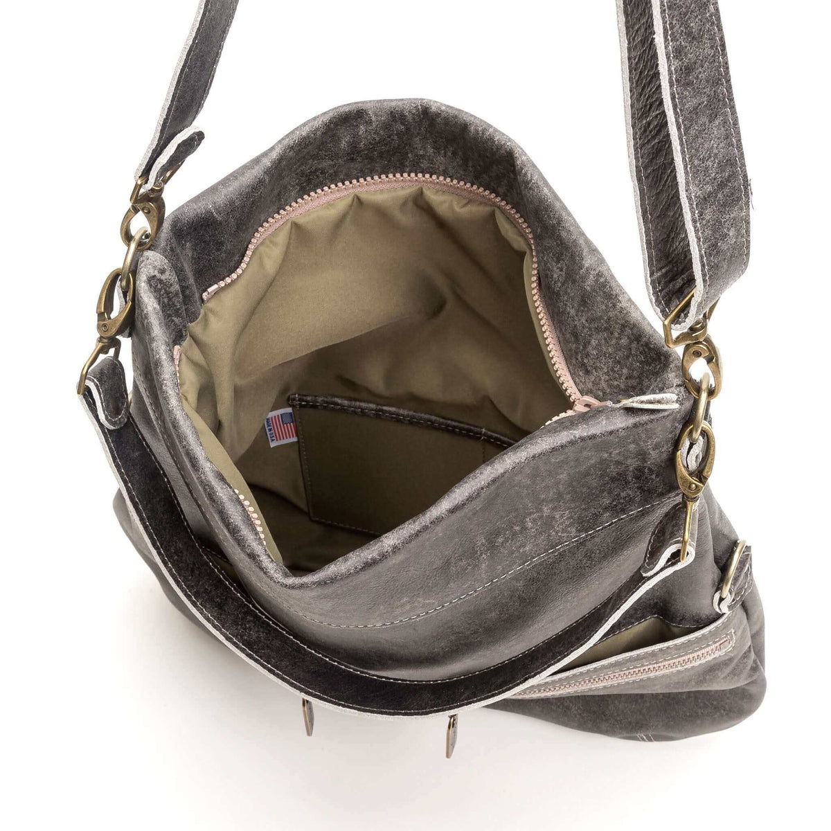 Inside view of the Original Lauren leather crossbody bag showing its spacious interior.