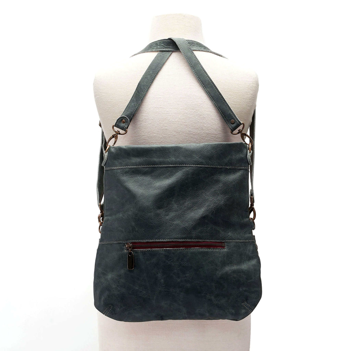 Mini Lauren leather crossbody bag in Aquarius, showcasing convertible design and stylish back view.