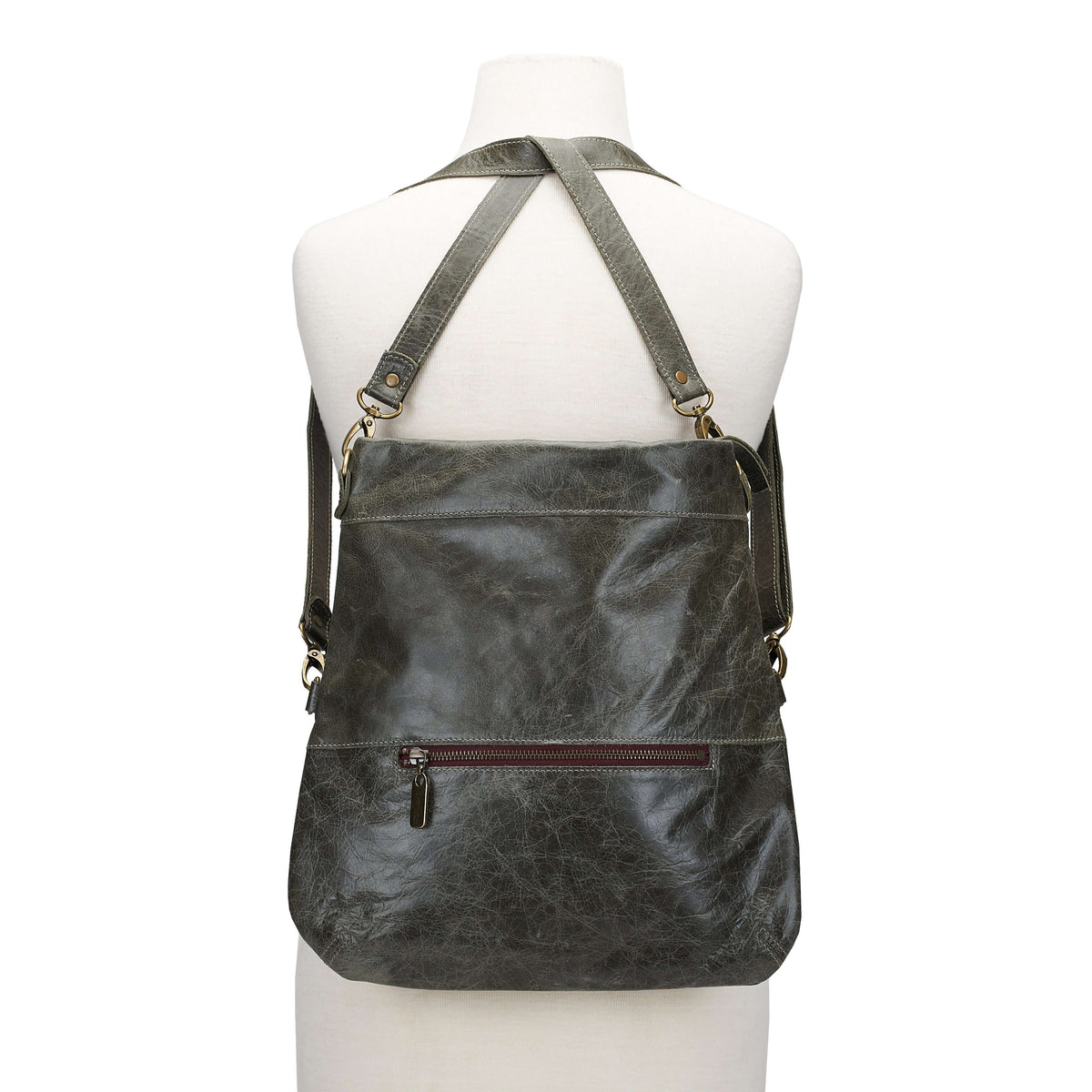 Mini Lauren 6-in-1 convertible leather crossbody bag in River Rock, showcased as a backpack. versatile design and grey leather materials.